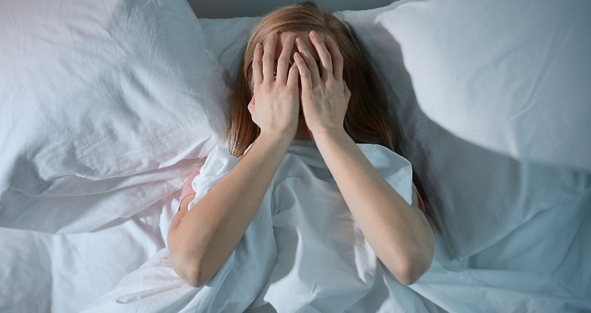 Why Do I Toss and Turn All Night? (Causes & How to Get Rest)